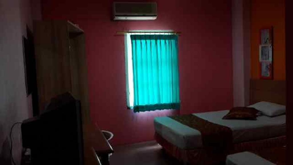 The Waigo Hotel סורונג חדר תמונה